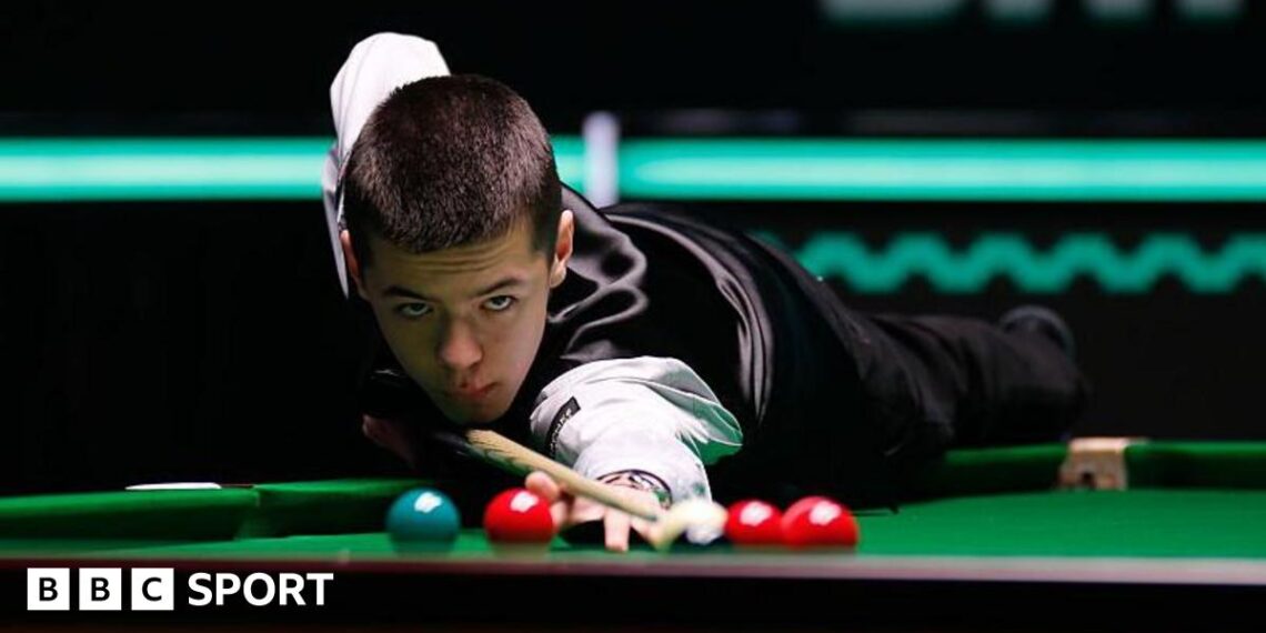 Michal Szubarczyk playing a shot