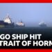 Cargo ship struck by projectile in strait of Hormuz as US insists ceasefire holding | BBC News