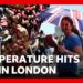 Hottest UK May day record broken again as temperature hits 35C in London | BBC News