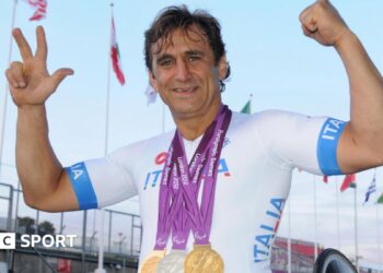 Alex Zanardi celebrates after winning a silver medal in the Team Relay event at the 2012 Paralympic Games. He also won two golds