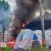 Angry crowd sets Ebola hospital tents on fire in DR Congo
