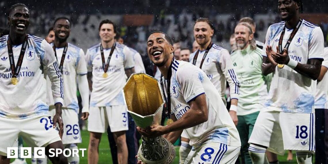 Youri Tielemans of Aston Villa FC lifts the trophy during the award ceremony following the UEFA Europa League final