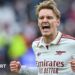 Martin Odegaard celebrates Arsenal's win.