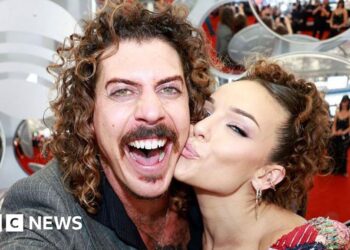 Australian musician's US ban prompts apology from girlfriend over Trump post
