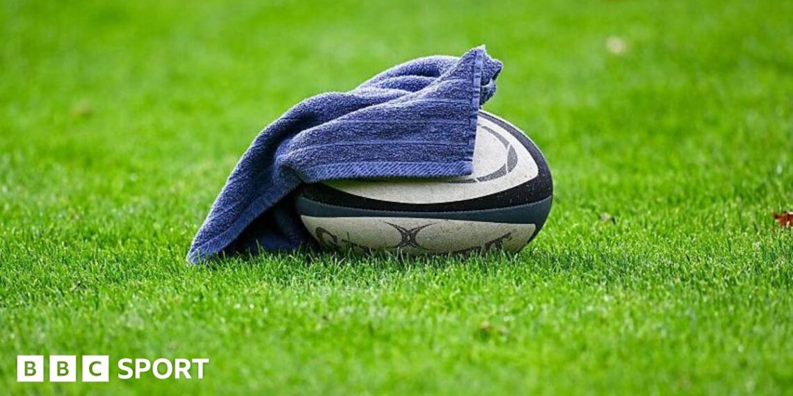 A rugby ball covered with a towel