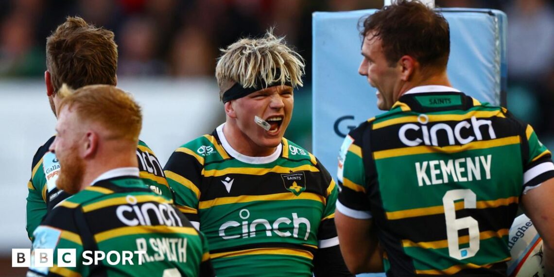 Northampton players celebrate a try