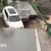 Car swept away after bridge collapse