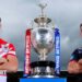 St Helens' Matty Lees and Wigan Warriors' Harry Smith stand alongside the Challenge Cup trophy