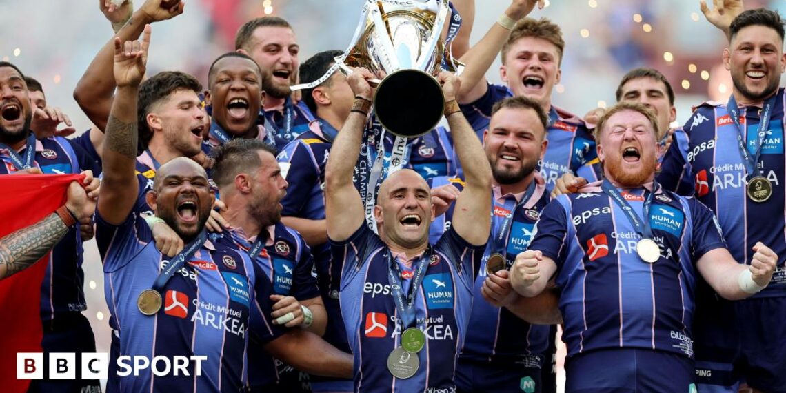 Maxime Lucu lifts the Investec Champions Cup trophy