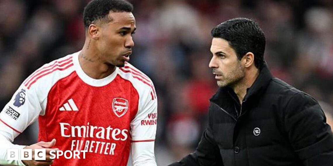 Arsenal manager Mikel Arteta talks to defender Gabriel