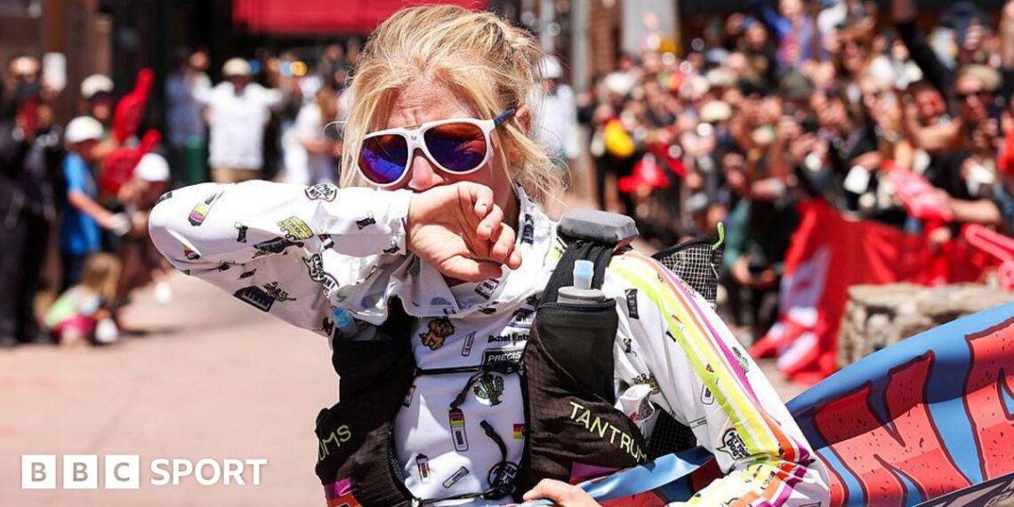 Rachel Entrekin looks emotional at the finish line of the Cocodona 250 ultramarathon