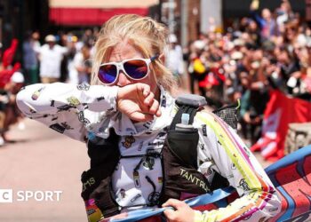 Rachel Entrekin looks emotional at the finish line of the Cocodona 250 ultramarathon