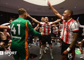 Taylor Harwood-Bellis and his Southampton teammates celebrate in the dressing room after the Championship play-off semi-final win over Middlesbrough