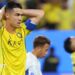 Referee Michael Salisbury signals before he awards a second goal to Matheus Cunha of Manchester United after a VAR check