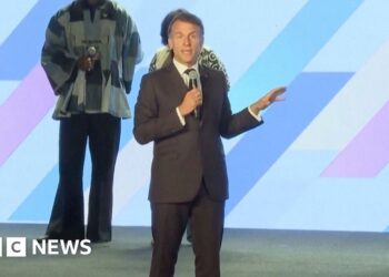 Emmanuel Macron interrupts speaker to ask for silence