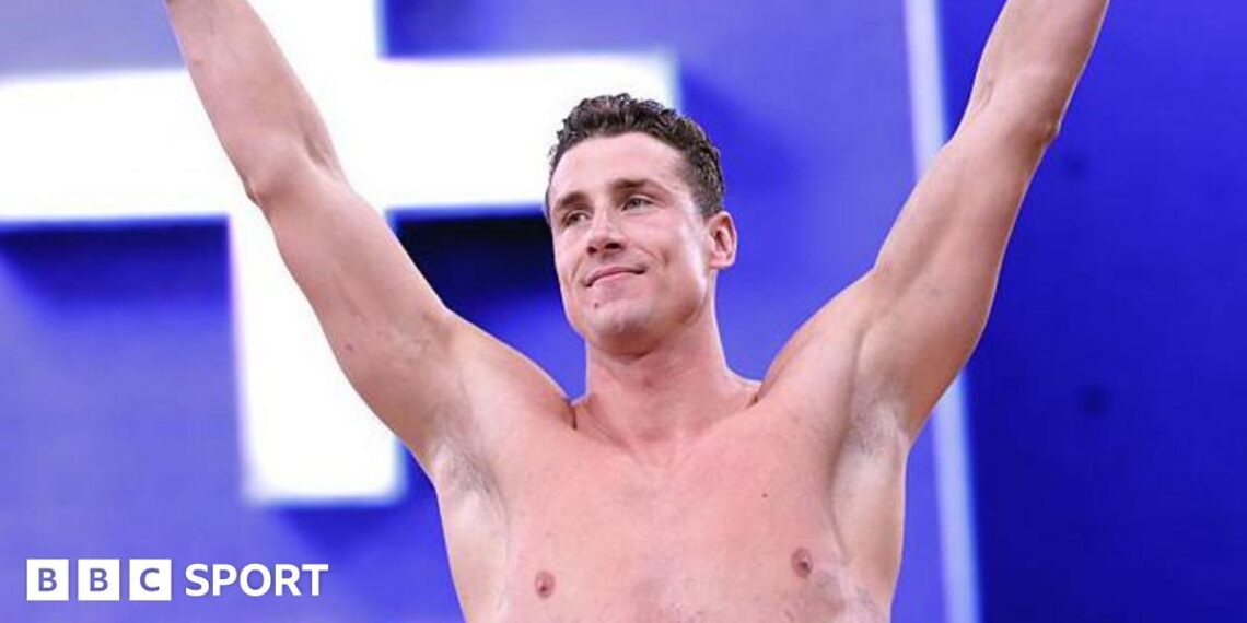 Kristian Gkolomeev celebrates winning the men's 50m freestyle at the Enhanced Games