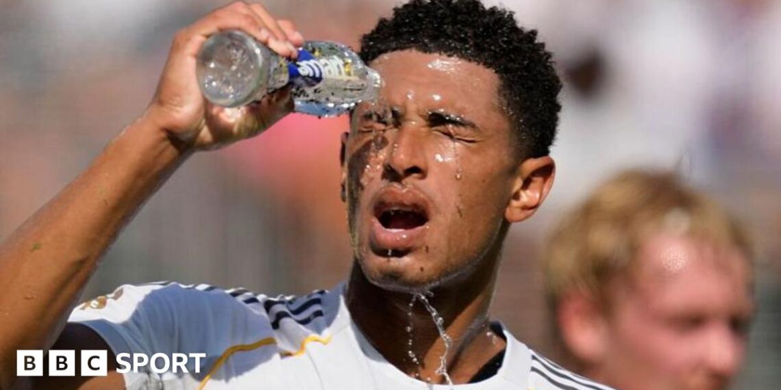 Jude Bellingham pours water over his face while playing for Real Madrid at the Club World Cup