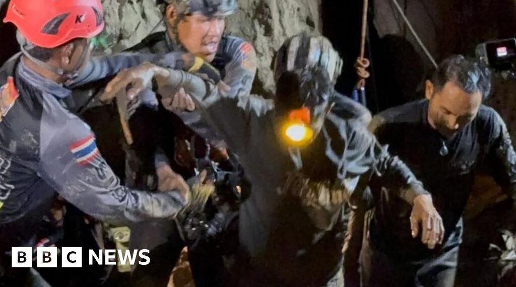 First of five men found alive in flooded Laos cave rescued
