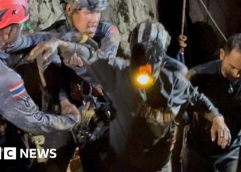 First of five men found alive in flooded Laos cave rescued