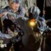 First of five men found alive in flooded Laos cave rescued