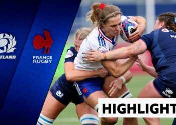 Lea Champon of France is tackled by two Scottish players