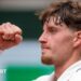 Great Britain's Toby Samuel celebrates winning in French Open qualifying