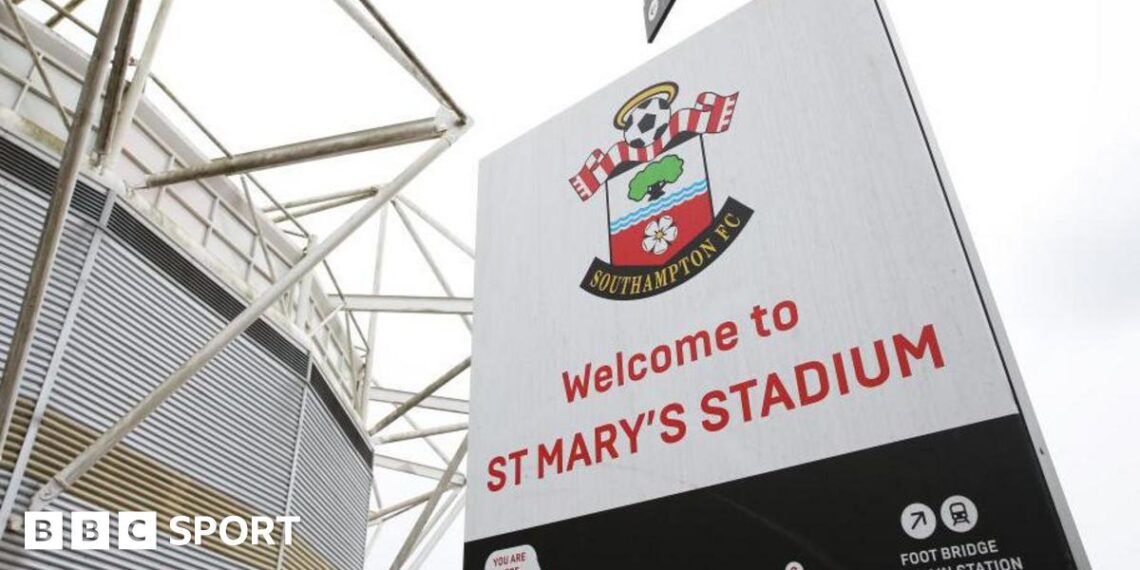 A general view of a sign showing Southampton's badge outside St Mary's Stadium