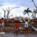 How do hurricanes and typhoons form and is climate change making them stronger?