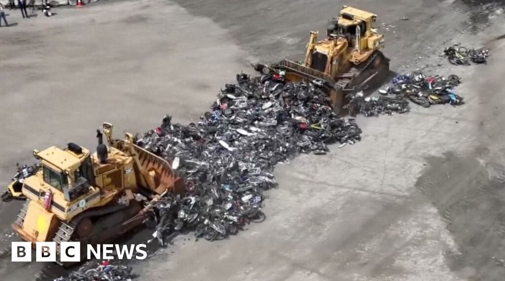 Hundreds of illegal motorbikes bulldozed in NYC crime crackdown
