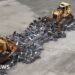 Hundreds of illegal motorbikes bulldozed in NYC crime crackdown