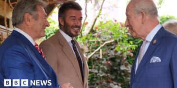 King all smiles as he meets David Beckham at Chelsea Flower Show