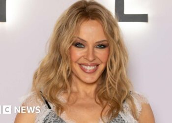 Kylie Minogue says cancer experience 'still with me'