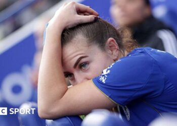 Shannon O'Brien holds her head