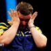 An emotional Luke Littler wipes away tears after beating Luke Humphries to win  the 2026 Premier League Darts