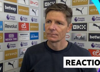 Oliver Glasner in post-match interview standing against advertising board