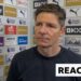 Oliver Glasner in post-match interview standing against advertising board