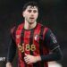 Marcos Senesi running while playing for Bournemouth