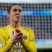 Referee Michael Salisbury signals before he awards a second goal to Matheus Cunha of Manchester United after a VAR check