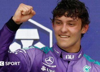 Kimi Antonelli celebrates with members of his Mercedes team after winning the Miami Grand Prix