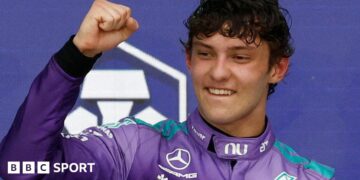 Kimi Antonelli celebrates with members of his Mercedes team after winning the Miami Grand Prix