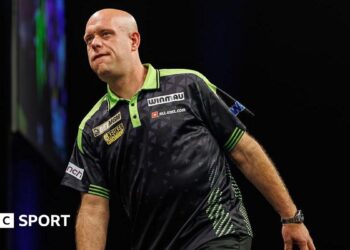 Michael van Gerwen looking frustrated figure during his loss to Luke Humphries