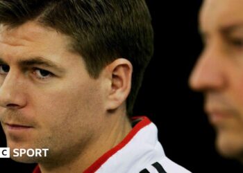 Former Liverpool captain Steven Gerrard celebrates winning the Champions League in 2005 with manager Rafael Benitez.