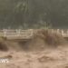 Moment Indonesian river overflows from heavy rain