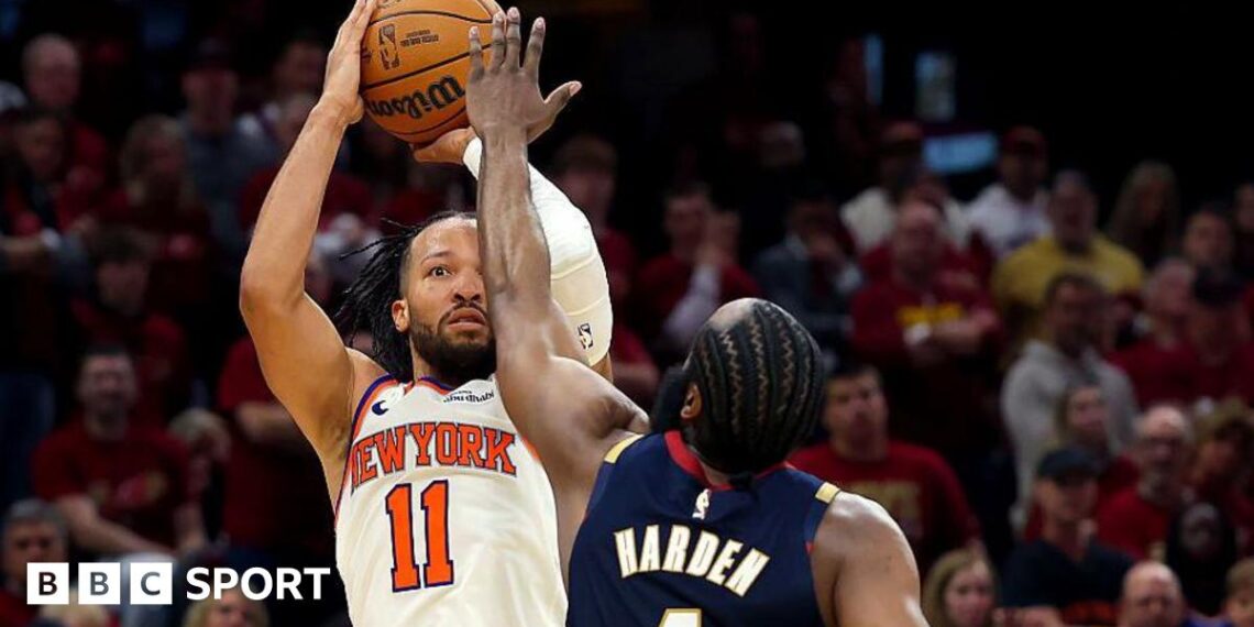 The New York Knicks' Jalen Brunson shoots the ball as he is challenged by the Cleveland Cavaliers' James Harden