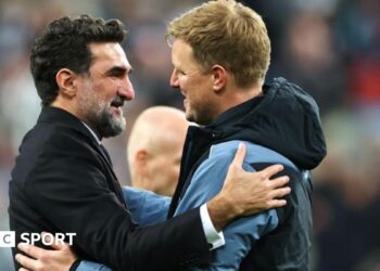 Yasir Al-Rumayyan hugs Eddie Howe