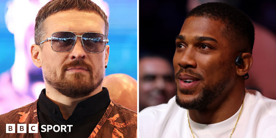 Oleksandr Usyk wearing sunglasses and and orange vest and Anthony Joshua wearing a white t-shirt