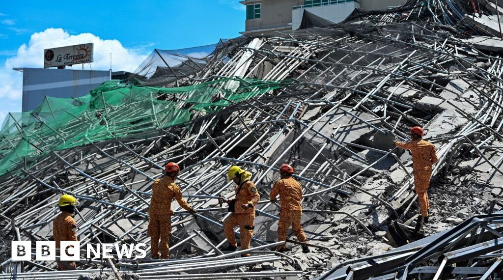 One killed and many feared trapped under collapsed building in Philippines