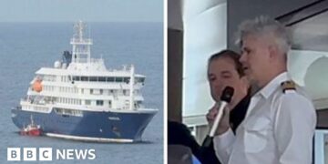Passengers told virus-hit cruise ship 'not infectious' after first death