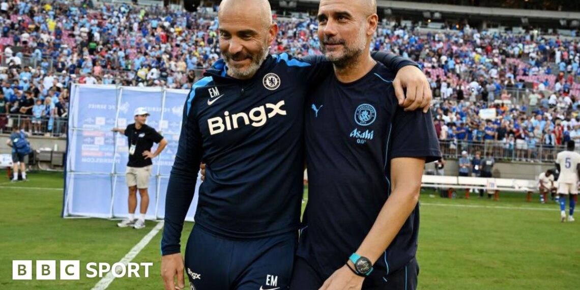 An image of Enzo Maresca, manager of Chelsea, and Pep Guardiola, manager of Man City embracing on the pitch.
