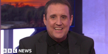 Peter Kay show evacuated and man held as police investigate 'suspicious bag'